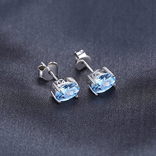 JewelryPalace Pendientes 1.9ct Genuino Topacio azul cielo Oval Natural Piedra de nacimiento Aretes Plata de ley 925