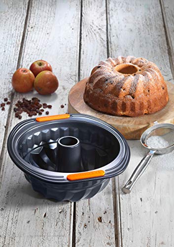 Le Creuset Molde bundt redondo, diametro 22 cm, Libre de PFOA, Resistente a ácidos, Revestimiento de acero al carbono, Gris y Naranja