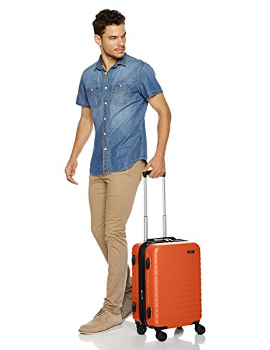 AmazonBasics - Maleta de viaje rígida giratori- 55 cm, Tamaño de cabina, Naranja fuerte