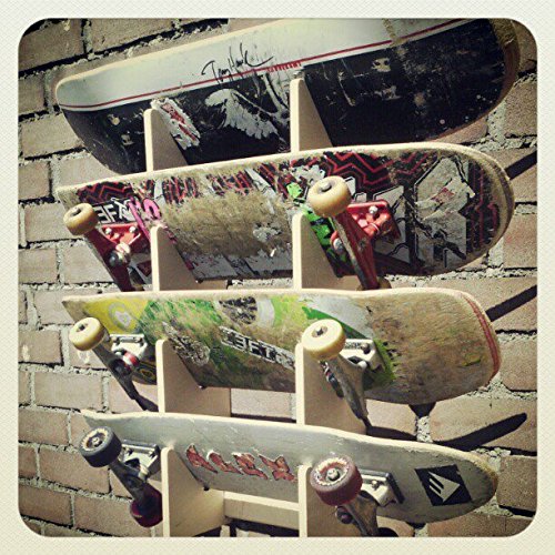 Estante de pared para skateboards