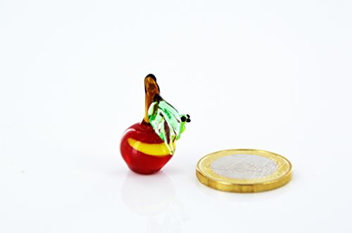 Figura de manzana con gusano (cristal), diseño de manzana con gusano