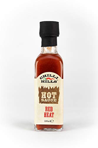 Chilli Hills salsa picante artesanal RED HEAT. Hecha con chiles NAGA INDIO y HABANERO ROJO, cultivados en nuestro huerto familiar. 100 % natural, sin OMG ni gluten, vegano. Botellita - 100 ml