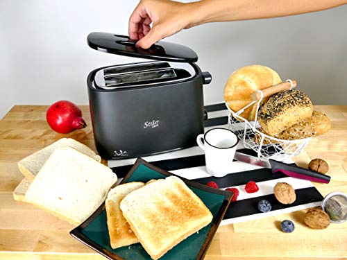 Tostador negro con tapa protectora Jata TT631 y con dos ranuras extra anchas. Con selector electrónico de tostado. 6 posiciones. Cuerpo toque frío. Bandeja recogemigas. Centrado automático del pan