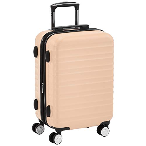 AmazonBasics - Maleta rígida giratoria prémium de 55 cm, rosa