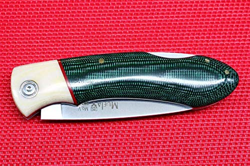 Muela Navaja GT-8G.B hoja de acero MoVa de 8 cm y empuñadura de micarta hueso y verde para Caza, Pesca, Supervivencia y Bushcraft Realizado en Ciudad Real + Portabotellas de regalo